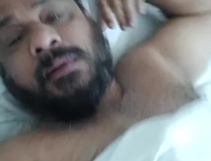 Indian Daddy Lying on the Bed Teasing and Posing for You