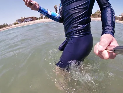 Surfer Gets Erect in His Lycra for the Pleasure of the People