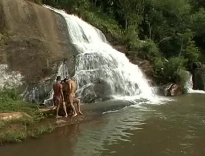 Three Nude in the River