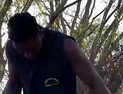 Vigilante Humiliating the Worker