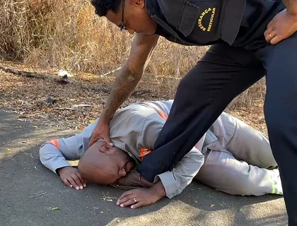 Vigilante Humiliating the Worker