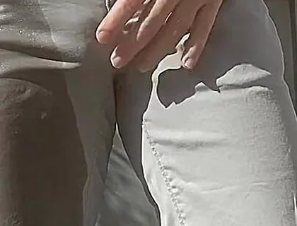 Jules Wets His Grey Pants and Exposes His Semi-hard Cock Through His Trousers