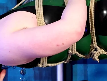 The Chastity Slave Is Bound in Ropes and Tormented with Feet