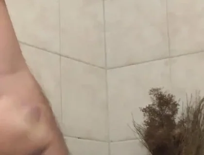 In the bathroom with a beach ball