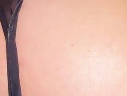 A Gay Man Dressed as a Woman Moves in a Seductive Manner.