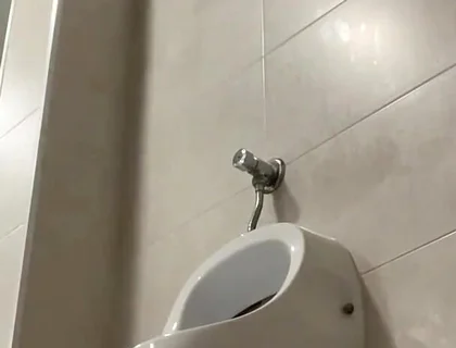 Amateur Twink Boy and Older Guy Caught Having Risky Fun in the Pool's Public Toilets