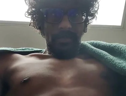 Masturbating