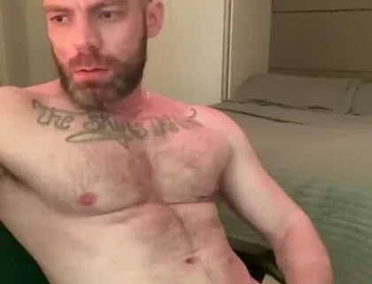 Masturbating