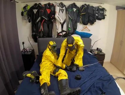 Vacuuming in tellchen hazmat suits