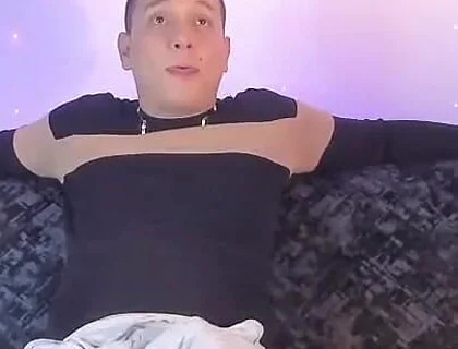 Latino Shows off His Bump on Camera Inside His Gray Sweatshirt