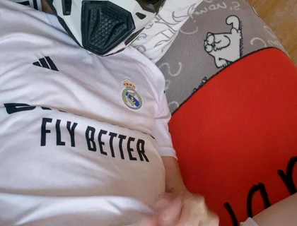 The Guy Is Wearing a Soccer Uniform and Mxhelmet with a Morning Cum