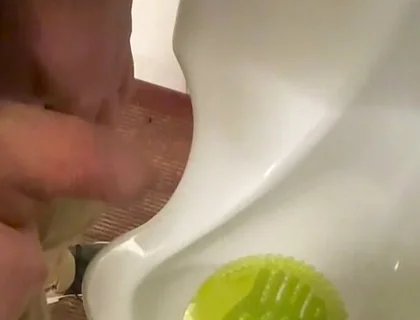 Amateur Redhead Guy Caught Pissing in a Public Toilet's Urinal - He Then Quickly Plays with His Cock Before Leaving