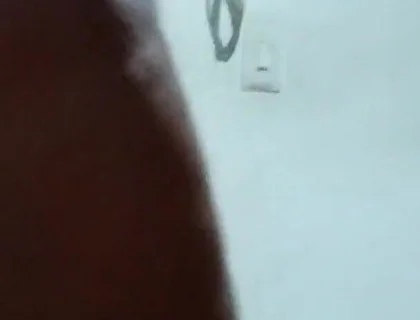 Spilling milk while my neighbor stares out the window