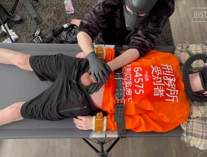 Gas Mask Boy Strapped Down and Edged