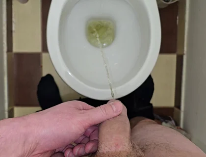 Pissing to the Toilet