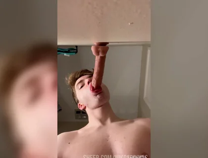 Cock Hungry Twink Slobbers on Giant Dildo!
