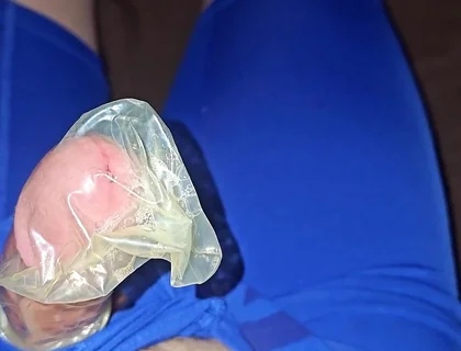 I wank and cum inside a condom while I wear my Blue Nike pro spandex underwear