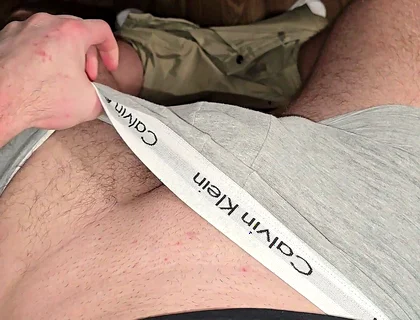 German masked guy rubs huge bulge.. grey Calvins down.. cock dripping heavy
