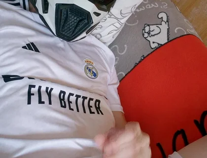 The Guy Is Wearing a Soccer Uniform and Mxhelmet with a Morning Cum
