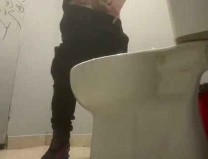 Amateur Friends Pissing Together in the Club's Toilets