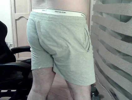Muscular Camboy Flexes His Muscles and Squats