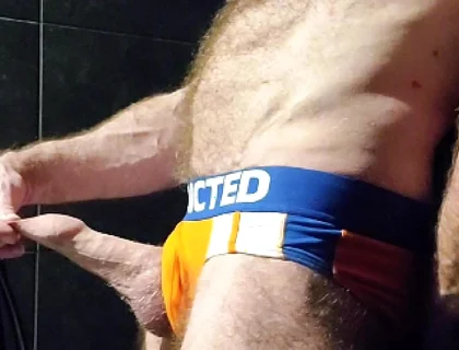 Muscle Bear Showing off His Uncut Cock