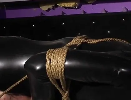 Roped in Latex: Zeus Struggles to Break Free