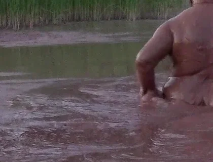 Mud Bath in Deep Quarry Mud Pond