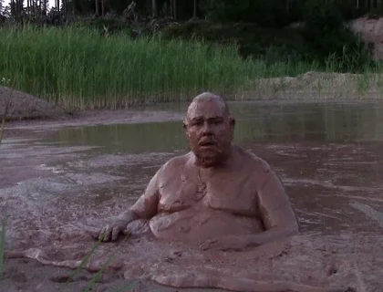 Mud Bath in Deep Quarry Mud Pond