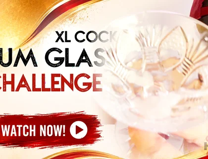 Cock Squirts in the Cum Glass at the Gloryhole