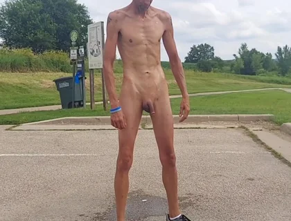 Naked and Pissing in Parking Lot