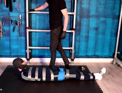 Bound and Struggling in Tape Bondage (4k)