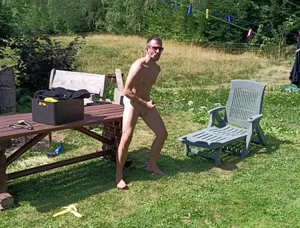 Jerking off While Hanging Out the Laundry