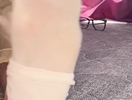 A University Rests Her Feet on Her Face so That the Adorers