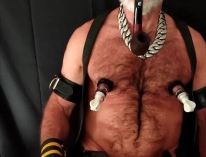 Stepdad Playing with Strap-on While Smoking His Pipe
