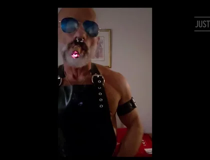 Stepdad lighting his Cigar in rubber apron