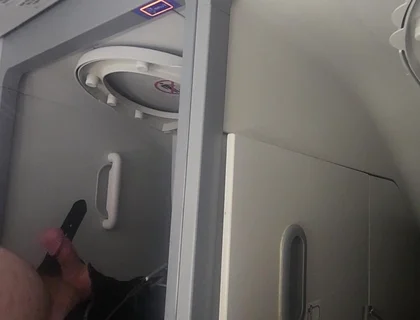 Airplane Bathroom Jerk and Cum.