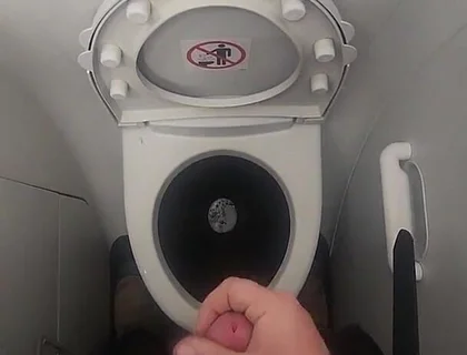 Airplane Bathroom Jerk and Cum.