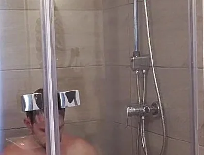 After a Full Day on the Road Wet Solo in the Hotel Shower