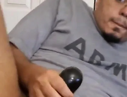 Browndicksavior Using His Oral Sex Toy and Stroking His Brown Cock