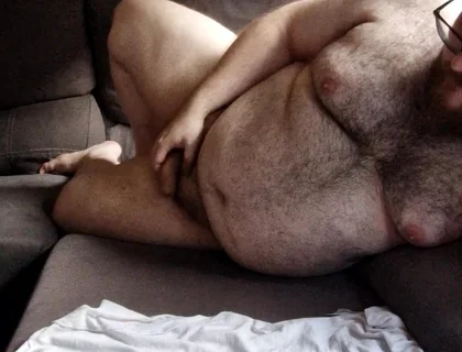 Fat Hairy Jerks off While Watching Porn