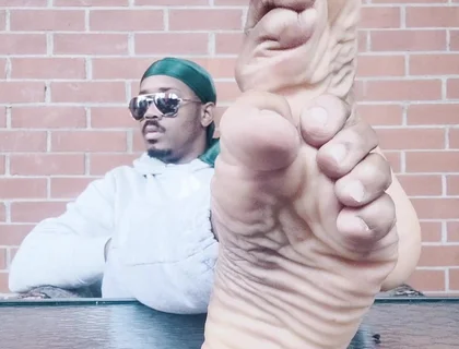 I Expose My Feet and I Touch Them