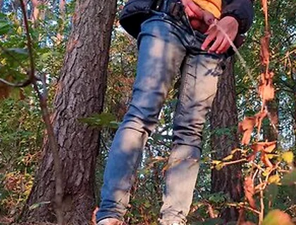 Guy Long Pissing In The Forest Under A Tree