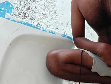 Washing the Bathroom in Xhard Village
