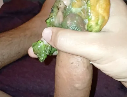 Enjoying a Donut with Haloween Decoration.