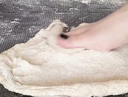 Squishing Pizza Dough