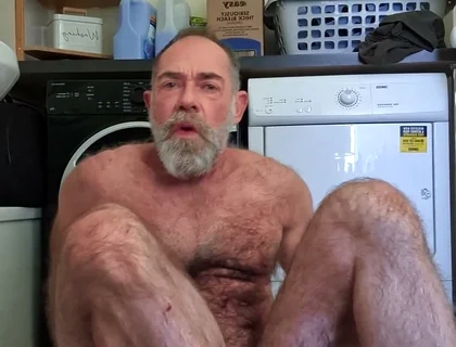 Hairy Bear Doing Laundry