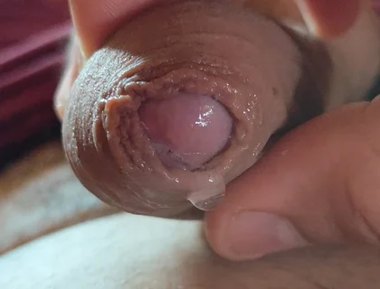 Close-up of Glans Ejaculating Intensely Before Cumming.