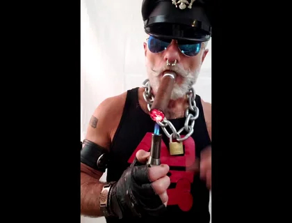 Leather Stepdad Lighting a Big Ring