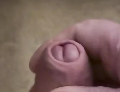 My Friend Sits in a Chair and Jerks off His Cock While Watching Video